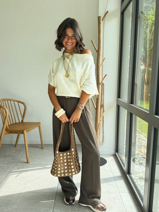 Sac en cuir taupe clouté doré