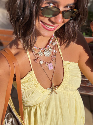Collier sur cordon rose médaille