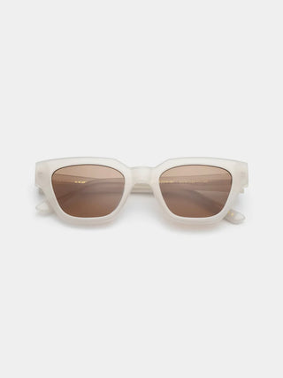 Solaire KAWS cream bone